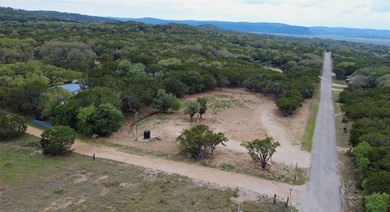 Unrestricted 1.24-acre corner lot in Lakehills offering a great - photo 2
