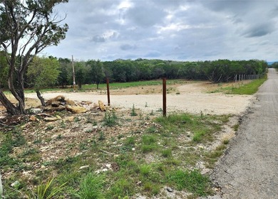 Unrestricted 1.24-acre corner lot in Lakehills offering a great - photo 3