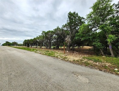 Unrestricted 1.24-acre corner lot in Lakehills offering a great - photo 4