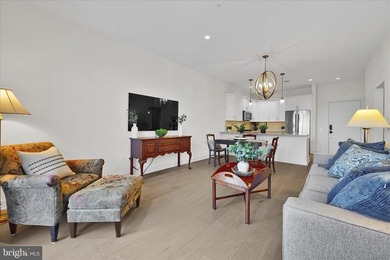 Welcome to Residence #215 at 575 South, where effortless luxury