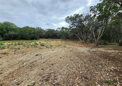 Unrestricted 1.24-acre corner lot in Lakehills offering a great - photo 9