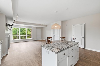 Experience sophisticated, low-maintenance living at **Wooddale - photo 7