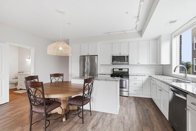 Experience sophisticated, low-maintenance living at **Wooddale - photo 9