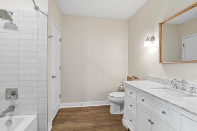 Experience sophisticated, low-maintenance living at **Wooddale - photo 10