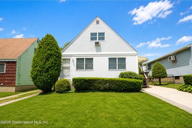 A charming 4-bedroom, 1-bath Cape Cod in Willowbrook, this home - photo 2