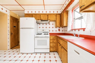 A charming 4-bedroom, 1-bath Cape Cod in Willowbrook, this home - photo 9
