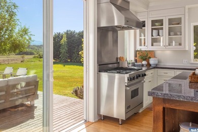 From the water's edge to the summit above, this rare 10-acre - photo 11