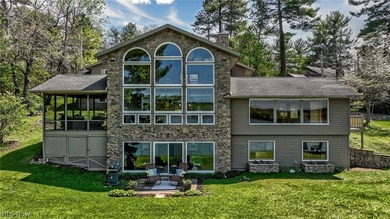 Stunning lake views immediately capture your attention upon - photo 3