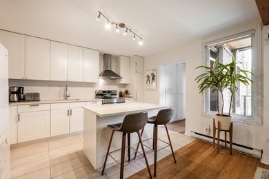 Magnifique condo de 2 chambres offrant un parfait melange de - photo 14