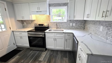 Fully renovated with bright spaces, this home truly is move-in - photo 4