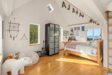 From the water's edge to the summit above, this rare 10-acre - photo 29