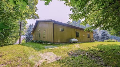 Live by Crystal Lake year-round in this 2010 ranch-style home - photo 31
