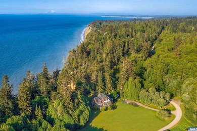 From the water's edge to the summit above, this rare 10-acre - photo 38