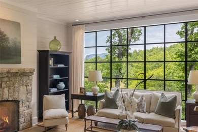 Nestled within the prestigious Wade Hampton Golf Club and just - photo 1