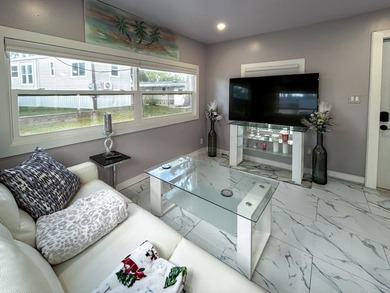 This glamorous waterfront home has been completely reimagined - photo 6