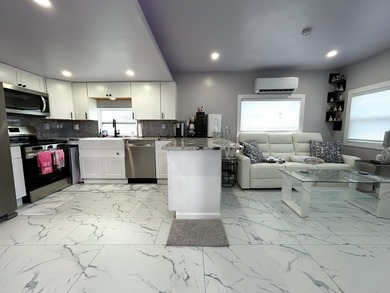 This glamorous waterfront home has been completely reimagined - photo 8
