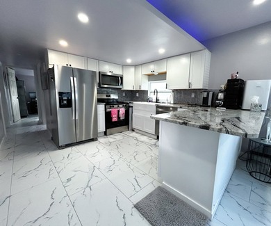 This glamorous waterfront home has been completely reimagined - photo 9
