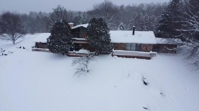 20 acre Hilltop estate. Private setting with miles of scenic