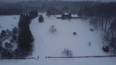 20 acre Hilltop estate. Private setting with miles of scenic