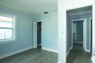 Home is move-in ready! This spacious 4-bedroom, 2-bath - photo 16