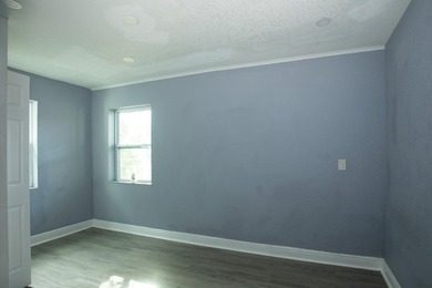Home is move-in ready! This spacious 4-bedroom, 2-bath - photo 19