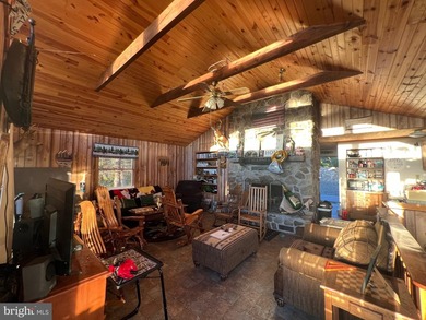 REDUCED!!! PRICE FIRM! This cabin is uniquely perched atop a - photo 5