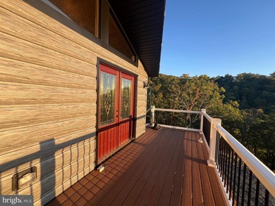 REDUCED!!! PRICE FIRM! This cabin is uniquely perched atop a - photo 7