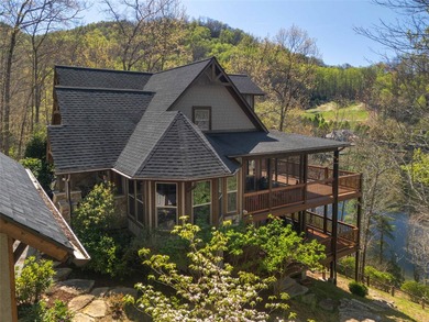 Nestled on a private cove of pristine Bear Creek Lake in the - photo 1