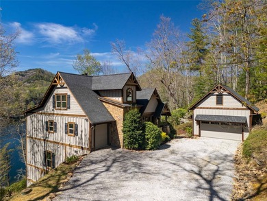 Nestled on a private cove of pristine Bear Creek Lake in the - photo 2