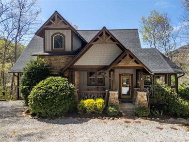 Nestled on a private cove of pristine Bear Creek Lake in the - photo 3