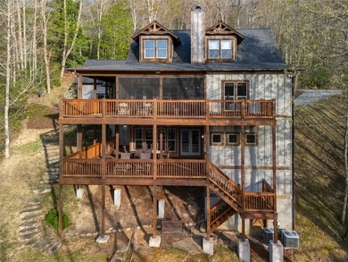 Nestled on a private cove of pristine Bear Creek Lake in the - photo 5