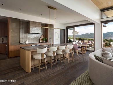Experience the pinnacle of mountain living in this impeccably - photo 7
