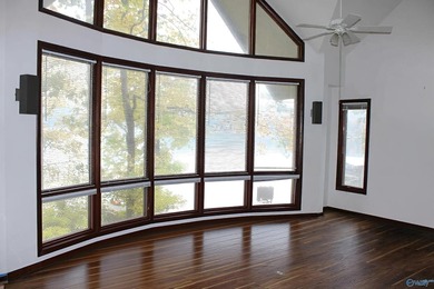 Waterfront living on Lake Guntersville! This 3BR/4BA home offers - photo 2