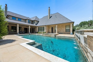 Nestled on a sprawling 1.229-acre lot within the prestigious - photo 2