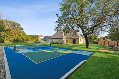 Nestled on a sprawling 1.229-acre lot within the prestigious - photo 3