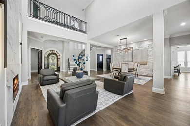 Nestled on a sprawling 1.229-acre lot within the prestigious - photo 9