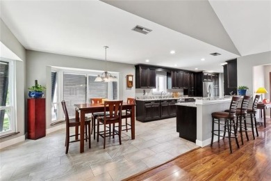 A true waterfront paradise on a rare triple lot in Venetian