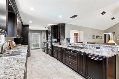 A true waterfront paradise on a rare triple lot in Venetian