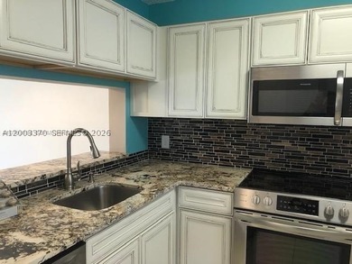 UPDATED UNIT WITH VERY NICE LAKE VIEW , SPACIOUS KITCHEN , AND - photo 1