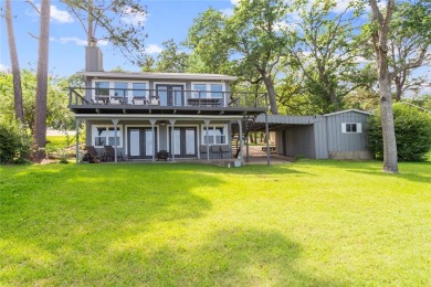 Enjoy deep water and miles of water view from this classic lake - Lake Home For Sale in Tool, Texas