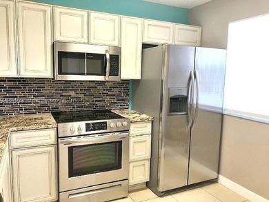 UPDATED UNIT WITH VERY NICE LAKE VIEW , SPACIOUS KITCHEN , AND - photo 2