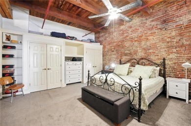 Ready to live in a boutique condo building in the historic