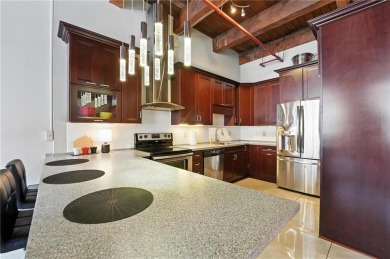 Ready to live in a boutique condo building in the historic