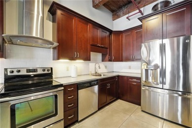 Ready to live in a boutique condo building in the historic