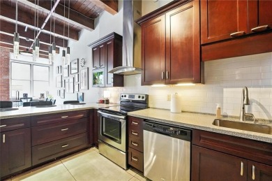 Ready to live in a boutique condo building in the historic