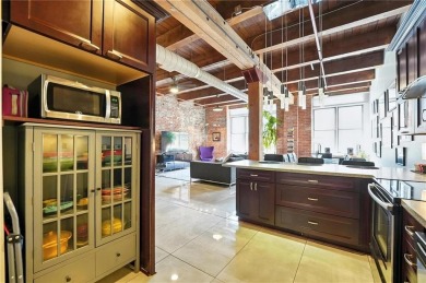 Ready to live in a boutique condo building in the historic