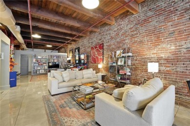 Ready to live in a boutique condo building in the historic