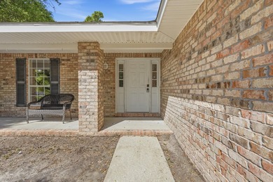 Welcome home to this beautifully maintained brick residence - photo 4
