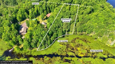 Build your Northwoods getaway on this beautiful waterfront lot - photo 1