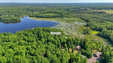 Build your Northwoods getaway on this beautiful waterfront lot - photo 7